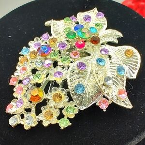 Beautiful silver flower and leaves multi-colored rhinestone broach